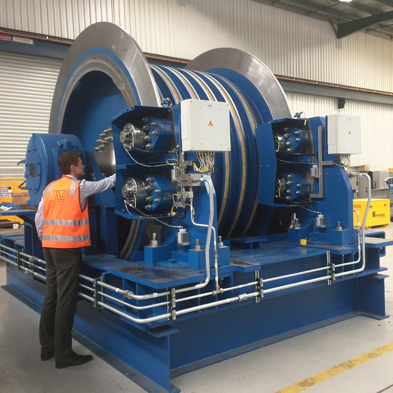 Man inspecting large machinery for safety